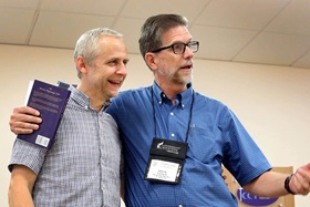 The Rev. Steve Manskar (r) leads Wesley Pilgrimage in England, which includes teaching from experts like the Rev. Phil Meadows. Photo by Kathleen Barry, United Methodist Communications.