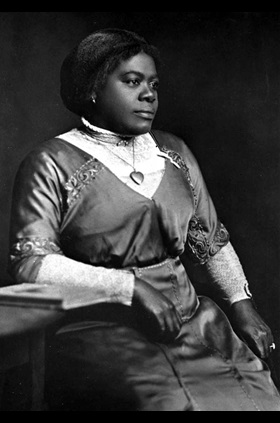 A portrait of Ida B. Wells-Barnett circa 1893, an early leader in the women’s and civil rights movements. Wells was active in the women’s suffrage movement but was asked not to march with white suffragists in 1913.   Albumen silver print by American female photographer, Sallie Garrity. Photo from the National Portrait Gallery, courtesy of Wikimedia Commons.