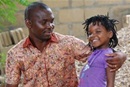 Pedro Chadreque Guambe and his daughter Wendy share a moment together. 