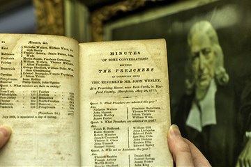 Historic record contains the minutes of an early conference of Methodist preachers. Photo by Kathleen Barry, United Methodist Communications. #UMCGC