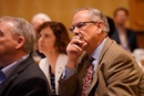 Bishop Laurie Haller (left), Bishop Bruce Ough (right) and other bishops listen to an legal presentation during their May 2019 meeting outside Chicago. Photo courtesy of Council of Bishops. 