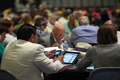 General Conference delegates in session. 
