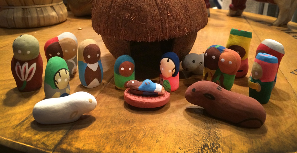 A Nativity set featuring a coconut stable or shelter and figures hand-made from clay, purchased during JoAnn Hall's first mission trip to Haiti. Photo by JoAnn Hall.