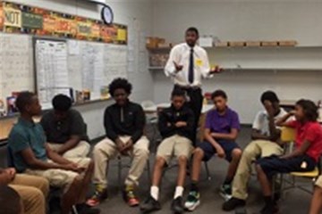 Former NBA player Shan Foster mentors a group of teens in partnership with the YWCA and United Methodist Men. Photo courtesy of Shan Foster. 