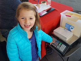 Six-year-old Ronyn Kelley collected items for her local food bank instead of birthday gifts. Photo courtesy of the Kelley family. 