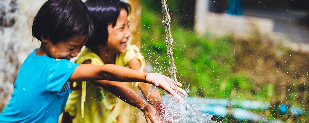 Children playing in clean water.