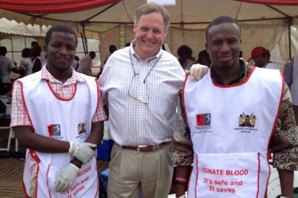 Scott Gilpin (center) stands with Red Cross workers with whom he volunteered in the days following the Westgate Mall massacre in Kenya. Photo courtesy of Scott Gilpin.  Scott Gilpin (center) stands with Red Cross workers with whom he volunteered in the days following the Westgate Mall massacre in Kenya. Photo courtesy of Scott Gilpin.