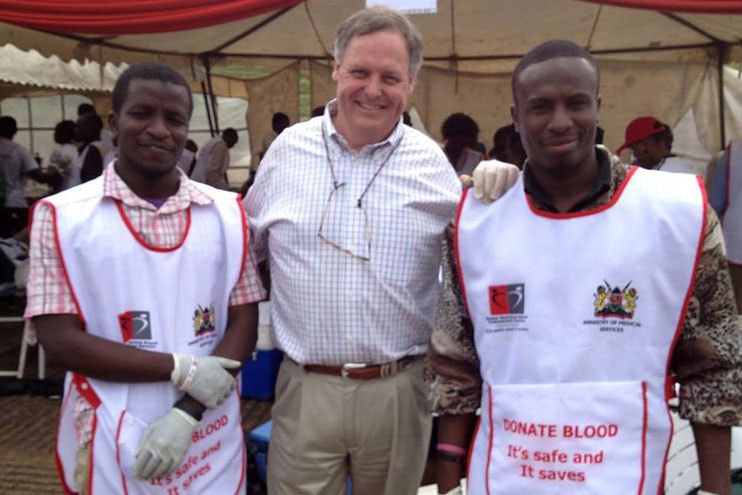 Scott Gilpin (center) stands with Red Cross workers with whom he volunteered in the days following the Westgate Mall massacre in Kenya. Photo courtesy of Scott Gilpin.