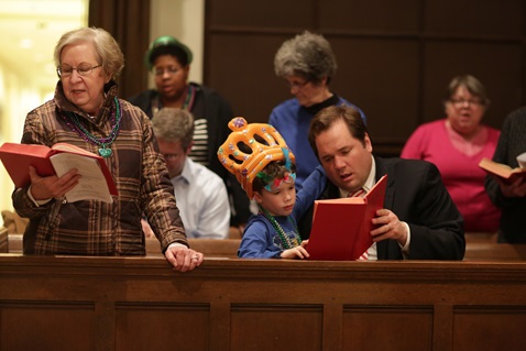 Congregants of West End United Methodist church join in singing from the hymnal during the Shrove Tuesday celebration held March 2, 2014 at West End United Methodist Church. Photo by Kathleen Barry, UMNS.