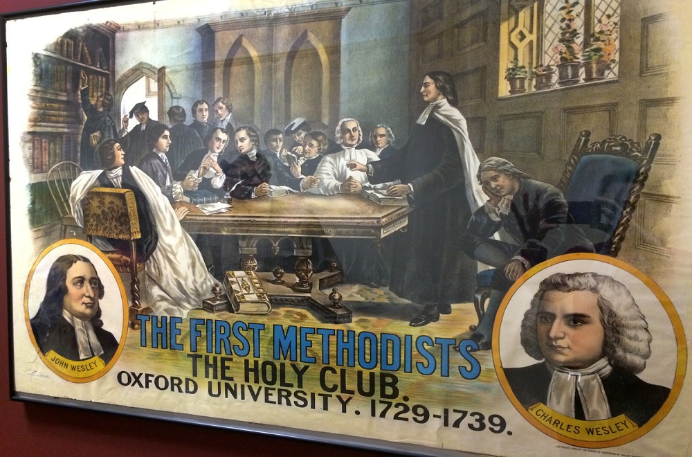 A poster, hanging at the Commission on Archives and History, celebrates the Holy Club that Charles and John Wesley led at Oxford University. Photo by Fran Walsh, United Methodist Communications