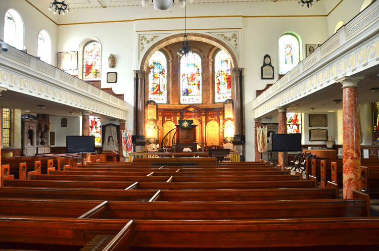 A view down the nave or principal longitudinal area of a church in Wesley's Chapel in the London Borough of Islington. Originally City Road Chapel, the Methodist church was built in 1778 under the direction of John Wesley. Photo by Bob Johnson, courtesy of Wikimedia Commons. 