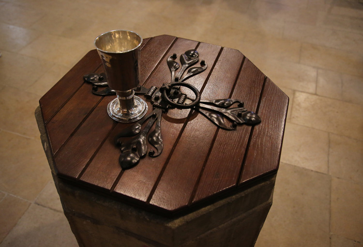 John Wesley was baptized at this font and made his First Communion with this chalice, both on display at St. Andrew's Parish Church in Epworth. Photo by Kathleen Barry, United Methodist Communications.