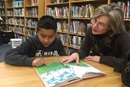 Mentor Susan Idleman (right), from First United Methodist Church Fort Worth's Kids Hope Mentoring ministry, reads with Johan (left), a fourth grader. The two meet weekly at Johan's school. Photo courtesy of Gay Ingram.