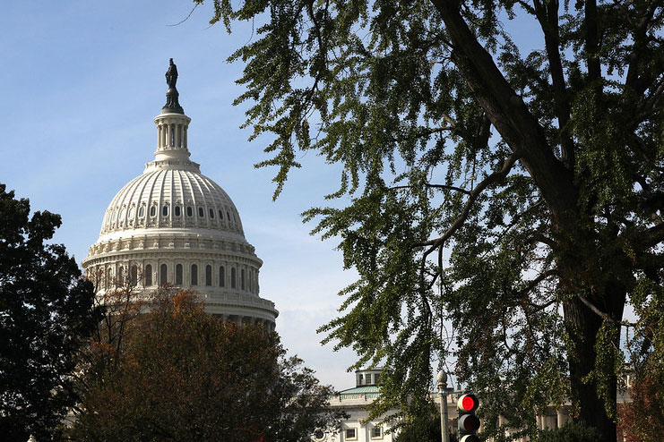 The U.S. Capitol is framed by trees across from the United Methodist Building in Washington, D.C. A UMNS file photo by Kathleen Barry.