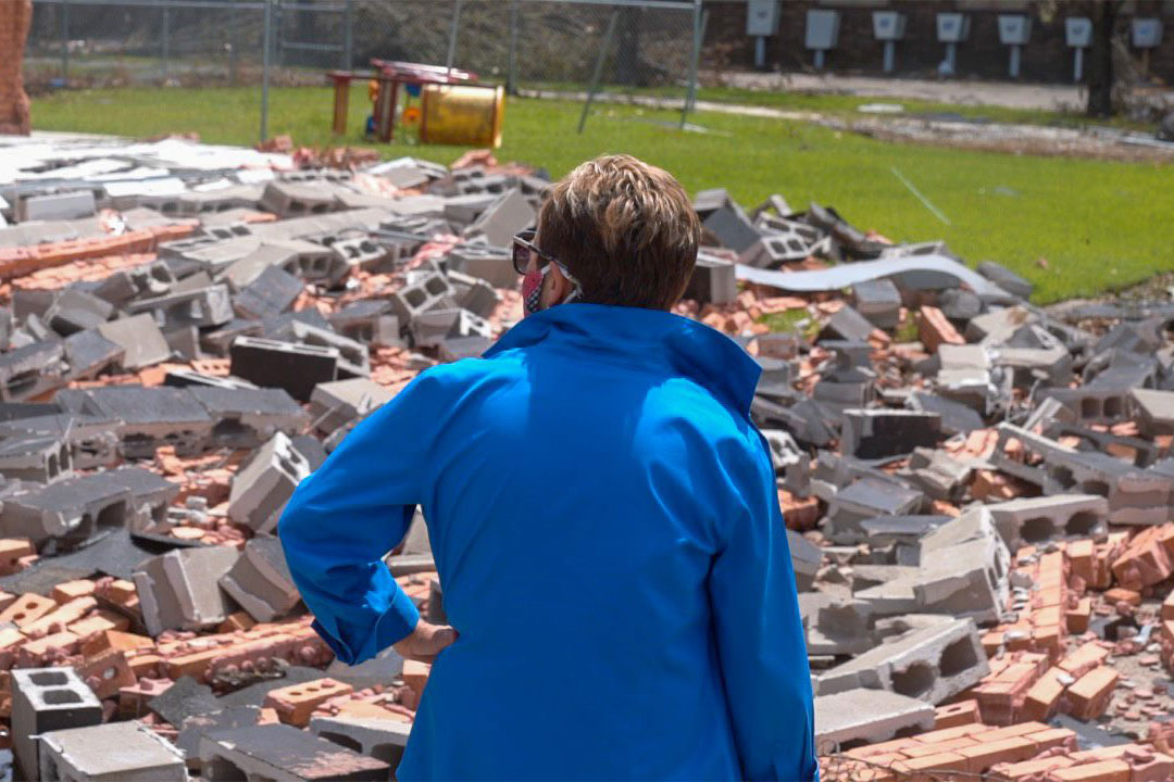 Bishop Cynthia Fierro Harvey views the damage to University United Methodist Church in Lake Charles, Louisiana. Photo courtesy the Louisiana Conference of The United Methodist Church.