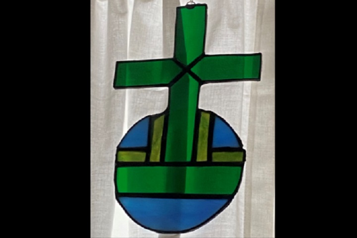 Christian symbol for the missionary cross in stained glass by Mary Helen Marigza
