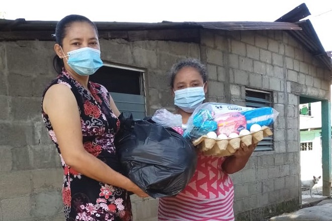 Women come for eggs and other food rations at a distribution point coordinated by the Methodist Mission in Honduras. Photo courtesy of The Methodist Mission in Honduras