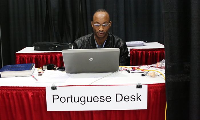 Nafral Oliveria Massela Nafral, conference communicator for Mozambique, works on the Portuguese desk during the 2016 United Methodist General Conference in Portland, Ore. Photo by Kathleen Barry, United Methodist Communications Kathleen Barry