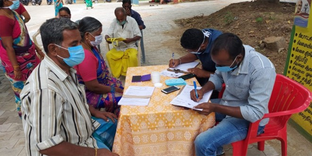 Staff of CMC Vellore check in members of the local community for the Vaccinate Vellore campaign. Photo: Courtesy of CMC Vellore