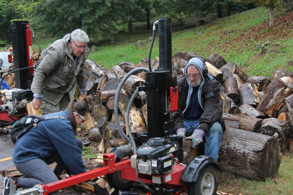 Cullowhee United Methodist Church members volunteer with Project Firewood, an outreach to supply firewood to elderly neighbors. Photo by Paul Heckert