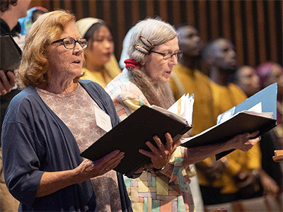   The Unity Choir, featuring members from five international congregations, sings during World Communion Sunday.