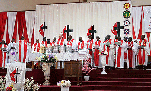 Bishops lead communion at the Memorial du Centenaire Cathedral at the opening worship service for the Africa Colleges of Bishops learning retreat in Lubumbashi, Congo, Sept 3. This year’s bishops meeting discussed regionalization, the definition of marriage and the future of The United Methodist Church in Africa, among other issues. Photo by Eveline Chikwanah, UM News.