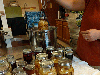 Harvesting the produce at the food preservation workshop. Courtesy photo.