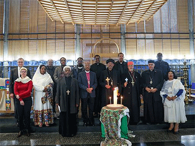 Leaders and representatives of the largest Ethiopian churches with the WCC staff members at a closing prayer at the Ecumenical Centre in Geneva.  Photo:  Ivars Kupcis/WCC