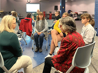 Loss of Turtle Island exercise participants at Lebanon Valley College share their impacted thoughts and feelings in Talking Circles. --Verna Colliver photo