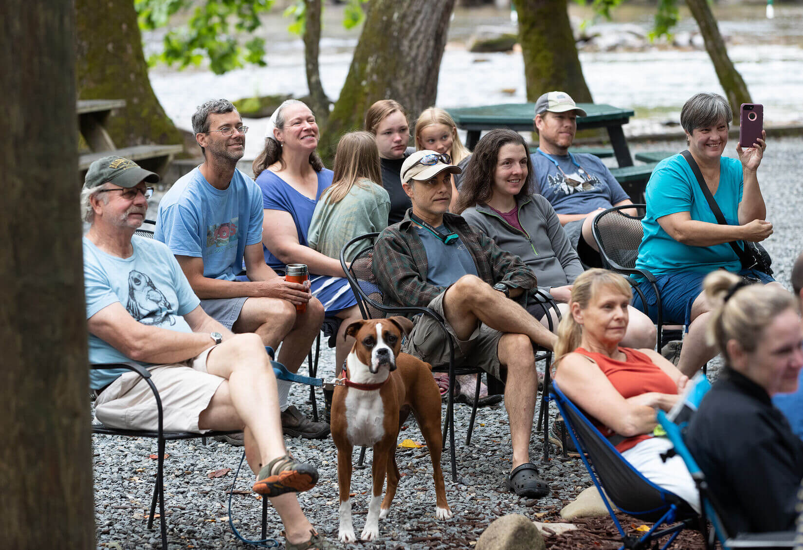 Parishioners listen during worship at the River of Life ministry, held at the Nantahala Outdoor Center near Bryson City, N.C. Photo by Mike DuBose, UM News.