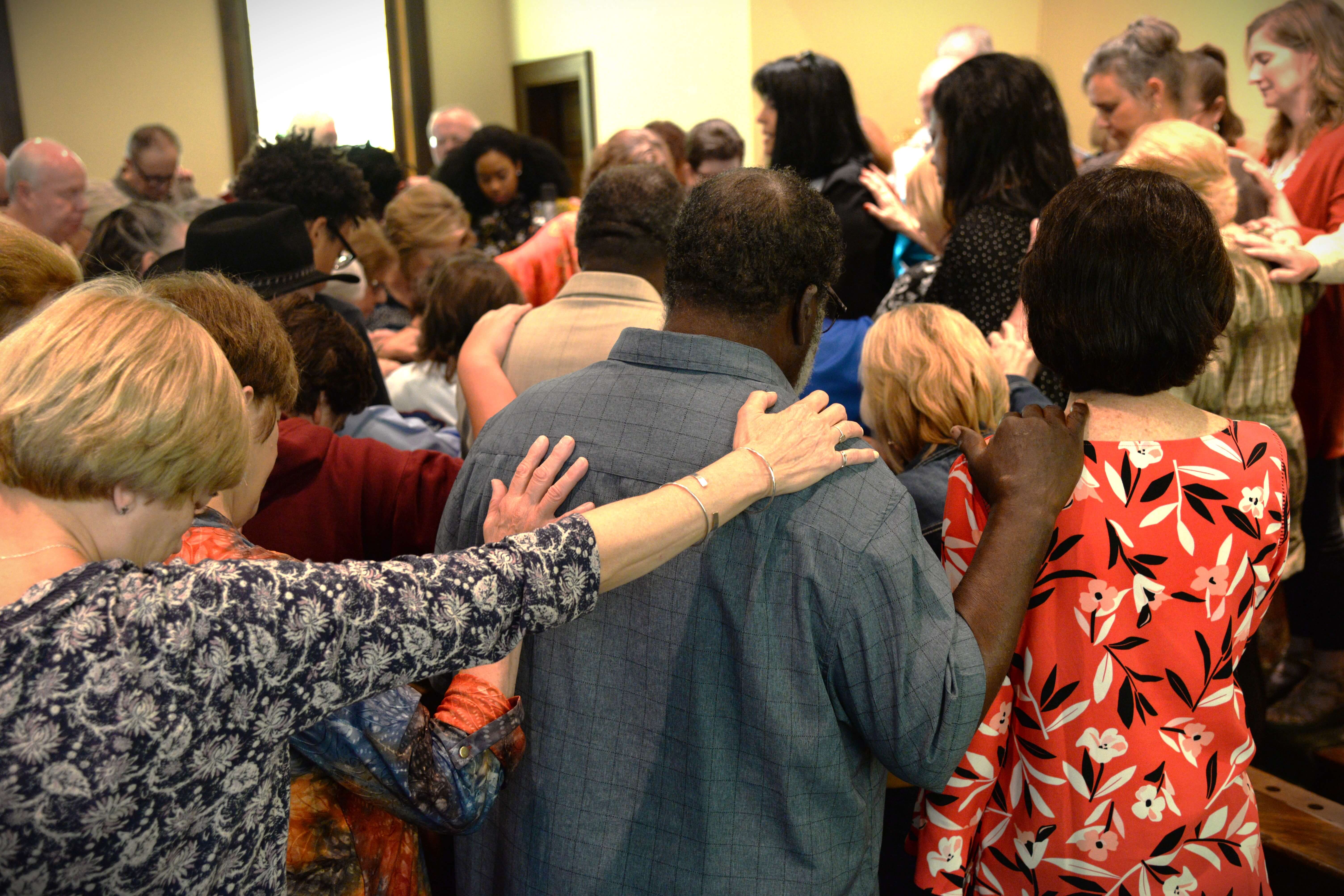 diverse-group-praying