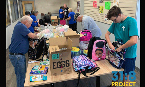 Members of McCabe UMC fill Bravery Backpacks for the 31:8 Project. Members of McCabe UMC fill Bravery Backpacks for the 31:8 Project.