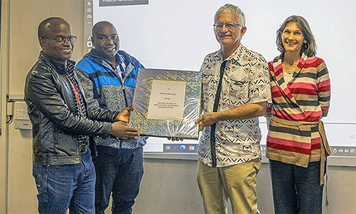 Larry and Jane Kies are recognized during a farewell ceremony held at Africa University in June 2024 as the couple retired from their Global Ministries missionary work after serving in Zimbabwe for three decades. Photo courtesy of Africa University Public Affairs Office.