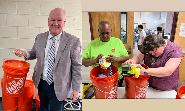 Jim Cox, UMCOR’s Executive Director, holds a finished disaster kit while other volunteers prepare a disaster kit. Courtesy photo. Jim Cox, UMCOR’s Executive Director, holds a finished disaster kit while other volunteers prepare a disaster kit. Courtesy photo.