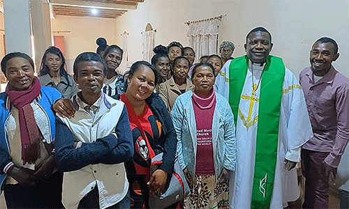 The Rev. Éric Kalumba (second from right) poses with church leaders at Ambodifasika United Methodist Church in Ambodifasika, Madagascar. After arriving last year, Kalumba went to work, convening the church council to listen to their concerns and develop strategies to expand The United Methodist Church in Madagascar. Photo by Esdras Rakotoarivony, UM News.