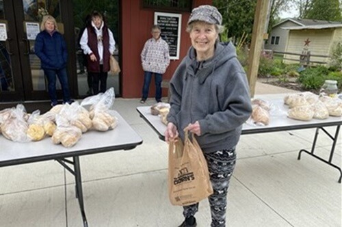 A Fresh Expression outreach effort at Mora UMC is reaching people one cup of coffee and one loaf of bread at a time. Courtesy Minnesota Conference