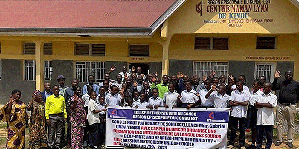 Members of Lokole United Methodist Mission in Kindu rejoice as they launch a new ministry dedicated to serving people who are hearing impaired. Photo by Chadrack Londe.