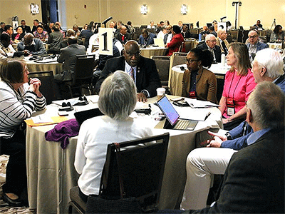 Bishops and ecumenical staff engage in small-group discussions about United Methodists’ relationships with fellow people of faith. Photo by Rick Wolcott, Council of Bishops.