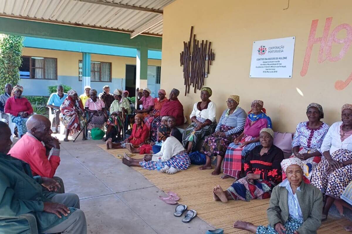 Residents at the Hulene Elderly Center gather to welcome the Mozambique South Conference Area United Methodist Youth to an event that nurtured connections between the generations, fostered understanding and encouraged further support.