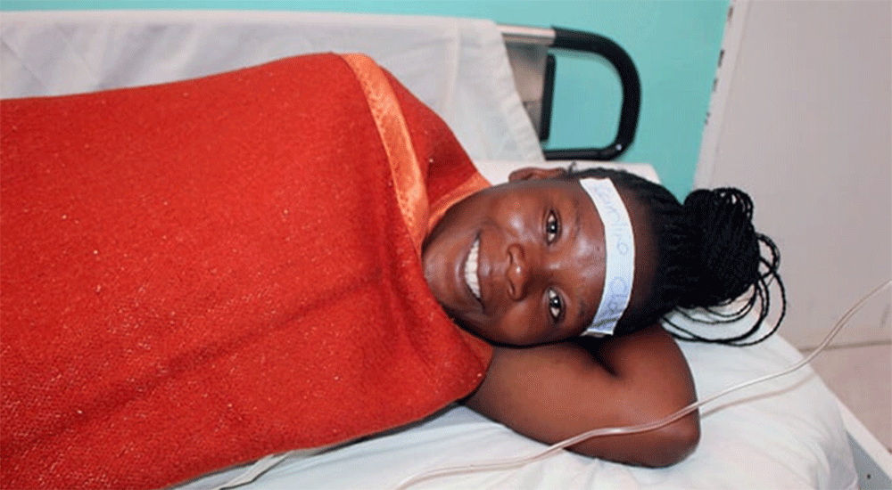 Caroline Checha, 26, from Zengeni Village Penhalonga, visits the Old Mutare Mission Hospital for a surgical procedure. Checha first came to the hospital in 2017 when she gave birth to twins. She was surprised and pleased with the upgrades. “The renovated theater is beautiful and modern.” Photo by Kudzai Chingwe, UM News.