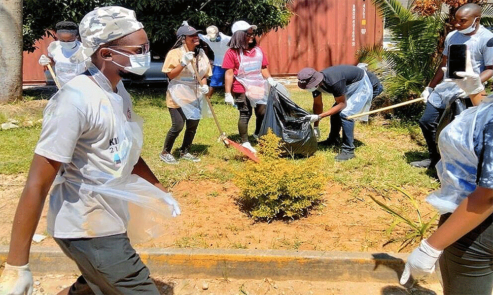 King David United Methodist Youth fellowship members outside Victoria Chitepo Hospital participating in a cleanup campaign and advocacy visit to highlight the need for accessible and equitable health care in Manicaland, Zimbabwe.