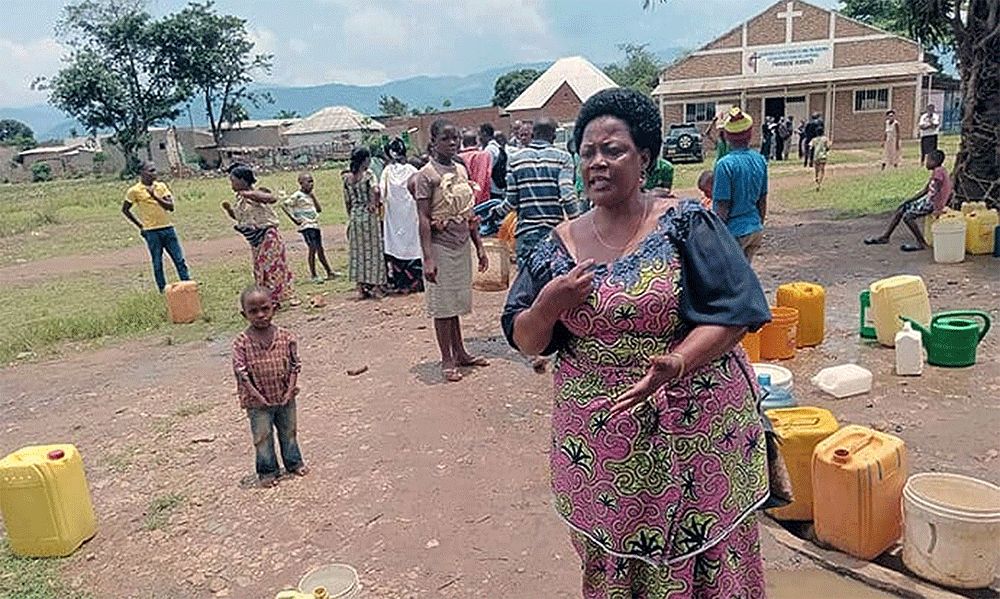 The Rev. Cimpaye Valentine, superintendent of the Bujumbura District, calls on the surrounding population to secure the borehole and ensure its proper use. The borehole is the result of a project financed by the United Methodist Committee on Relief. Photo by Jérôme Ndayisenga, UM News.