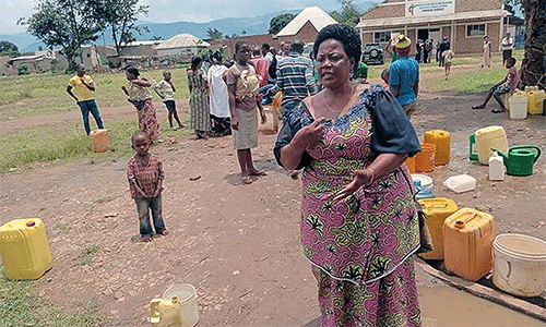 The Rev. Cimpaye Valentine, superintendent of the Bujumbura District, calls on the surrounding population to secure the borehole and ensure its proper use. The borehole is the result of a project financed by the United Methodist Committee on Relief. Photo by Jérôme Ndayisenga, UM News.
