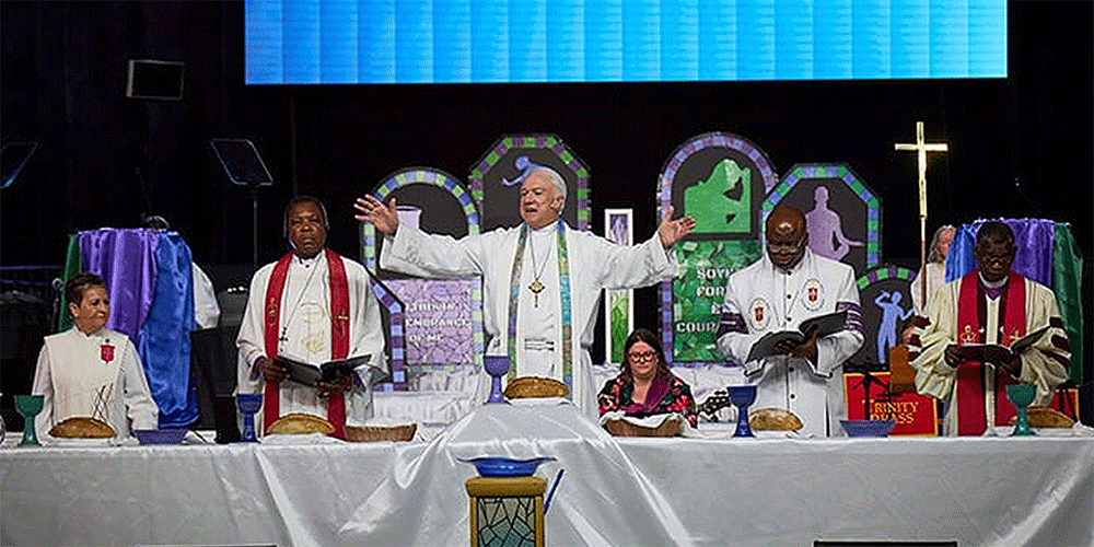 During the opening worship service of the 2024 General Conference, five United Methodist bishops from around the world celebrate communion with participants. The role of bishops as general superintendents is one of the few non-negotiable requirements in The United Methodist Church. Photo by Paul Jeffrey, UM News.