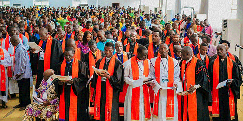 Clergy delegates participate in a historic joint conference session in December at the Jolly Nyame Stadium in Jalingo, Nigeria. The meeting brought together members of the five annual conferences in Nigeria, as well as representatives from the mission districts of Cameroon and Senegal and episcopal leaders from Liberia and Sierra Leone. Photo courtesy of UMCN Communications.