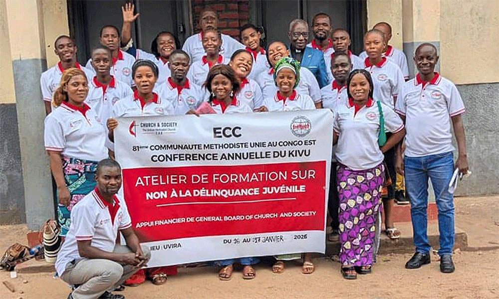 United Methodist youth leaders hold up a joint statement they prepared at the end of a training workshop in Uvira, Congo. The participants committed to promoting and restoring peace in their communities. Photo by Philippe Kituka Lolonga, UM News.
