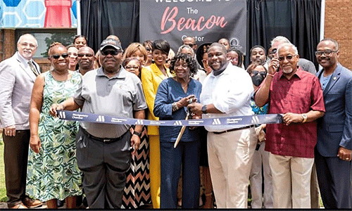 Ribbon-cutting ceremony (July 2022) for the Beacon Center in Montgomery, Alabama, a ministry of Metropolitan UMC. Rev. Richard WIlliams, first row, second from right, in the white shirt. Photo: Courtesy of Metropolitan UMC