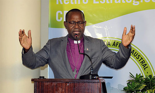 Bishop João Filimone Sambo prays during the Southern Africa Regional Conference’s strategic retreat held April 9-11 in Maputo, Mozambique. Sambo was the host bishop for the gathering. Delegates at the retreat crafted a roadmap for contextualized mission and ministry in Southern Africa. Photo by Roque Facela, UM News.