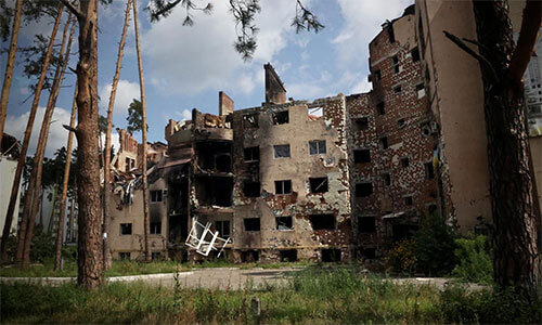 Destroyed residential buildings in Irpin, Kyiv region, Ukraine — a result of Russia's full-scale invasion of Ukraine, launched in February 2022. Photo:  Ivars Kupcis/WCC